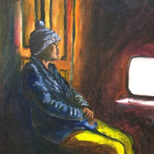 The lady in blue watches TV